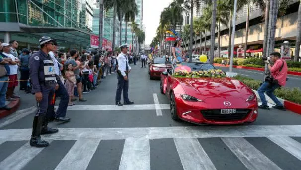 2017 Binibing Pilipinas A beauty contestant in a mazda MX-5 posing for a photo shoot at the 2017 Binibing Pilipinas pageant
