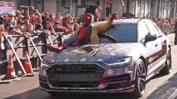 Spiderman sat atop the Audi A8