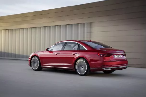 At the rear, the fascia is less upright and the tail lights are also revised with a single piece look angular rear of the Audi A8 2018