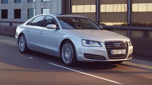 Angular front view of a Silver Audi A8 on road