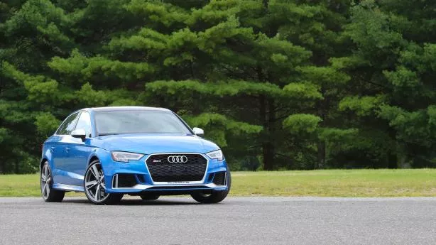 Angular front of a blue Audi RS3