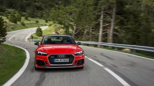 A red Audi RS5 on the road