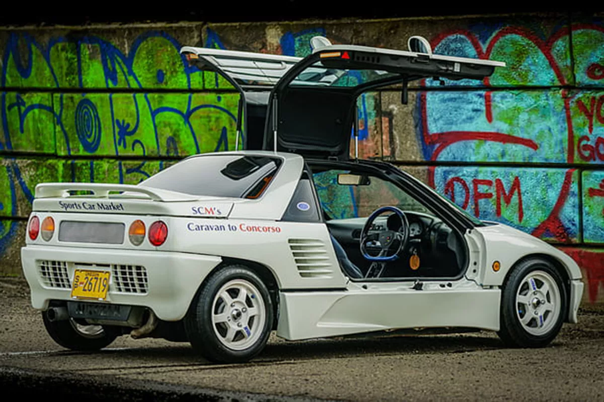 A picture of the Autozam AZ-1 with the doors open