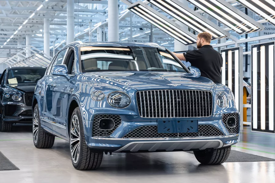 A picture of a Bentley Bentayga on the assembly line.