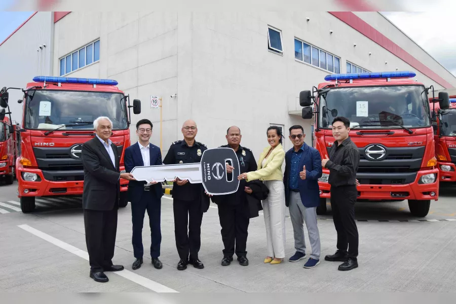 Hino executives and officers of the BFP at the hand-over ceremony for the new firetrucks