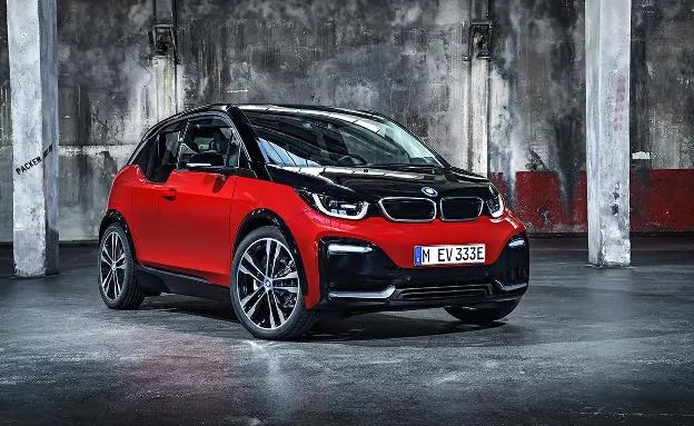 A red BMW i3s angular front view