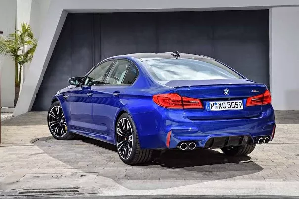 A blue 2018 BMW 5 angular rear view