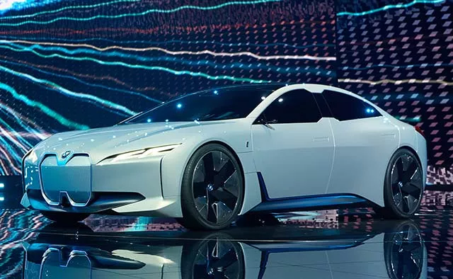 A white BMW I Vision Dynamics angular front view