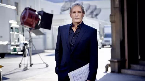 Michael Bolton in a blue suit