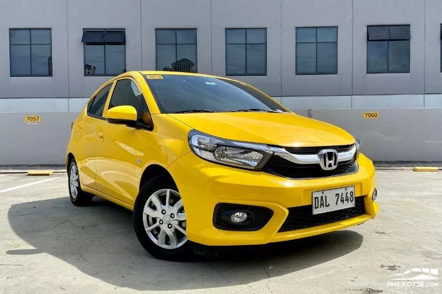 A picture of a yellow Honda Brio