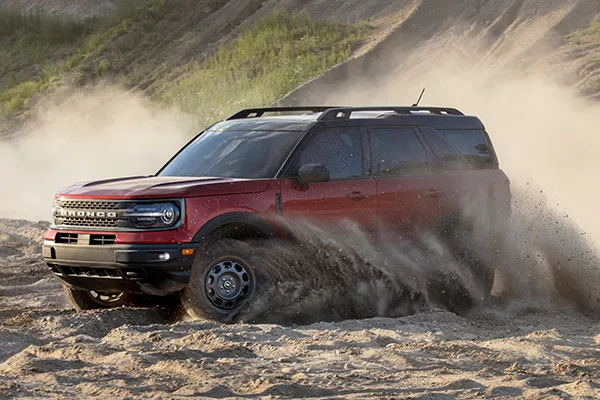 A picture of the Bronco Sport travelling through sand
