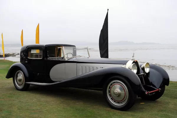 A picture of the Bugatti Royale Kellner Coupe in a car show