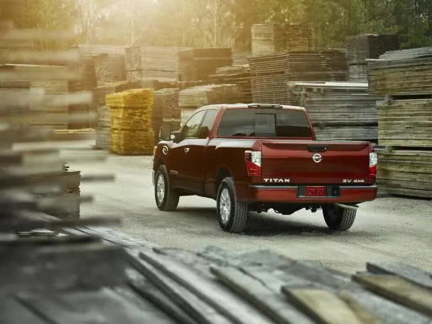 To possess a Titan XD PRO-4X 4x4, you have to put the cost of $50,490 Angular rear view of the 2017 Nissan Titan King Cab