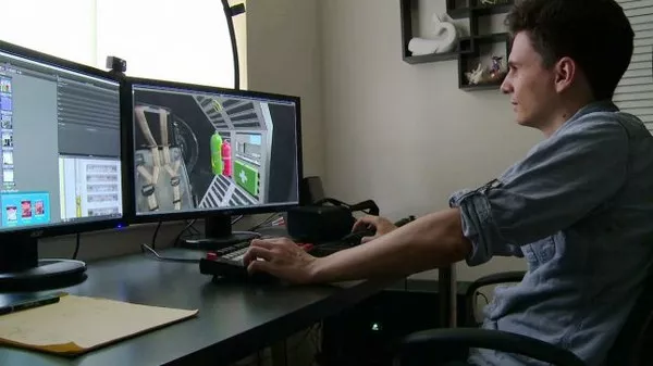 Being a game developer actually earns the right developers tons of money Man using a computer