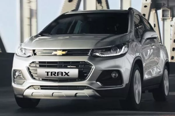 A picture of the Chevy Trax on a city road