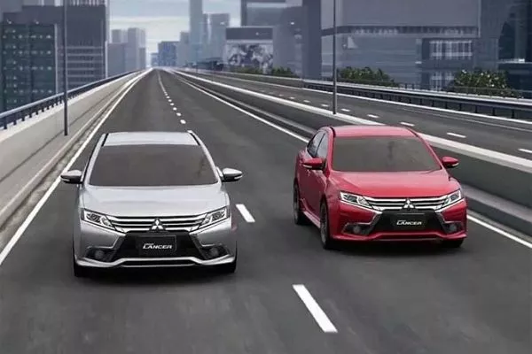 The Grand Lancer is basically a 10th-gen with a facelift A picture of the Mitsubishi Grand Lancer on the highway