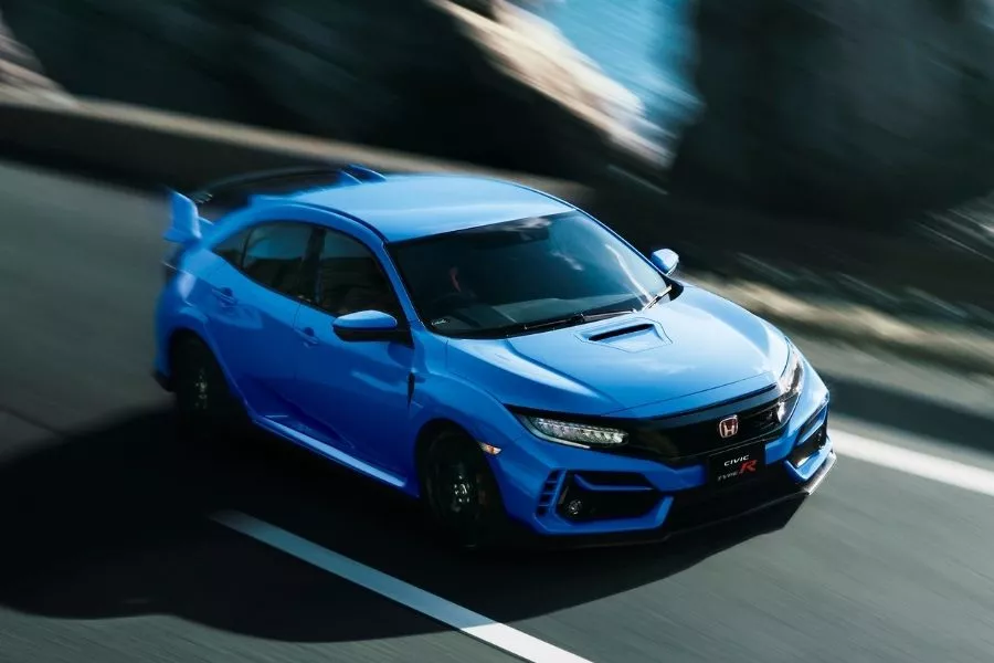 A picture of the Honda Civic Type R in Racing Blue on a coastal road