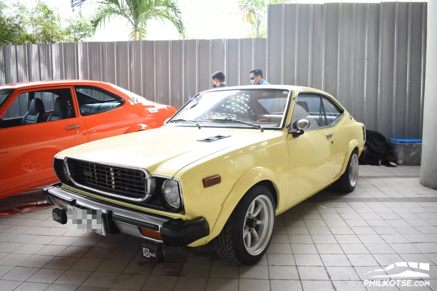 A picture of a classic Toyota Corolla at the 2022 MIAS.