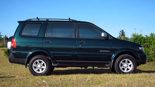 A green Isuzu Crosswind side view