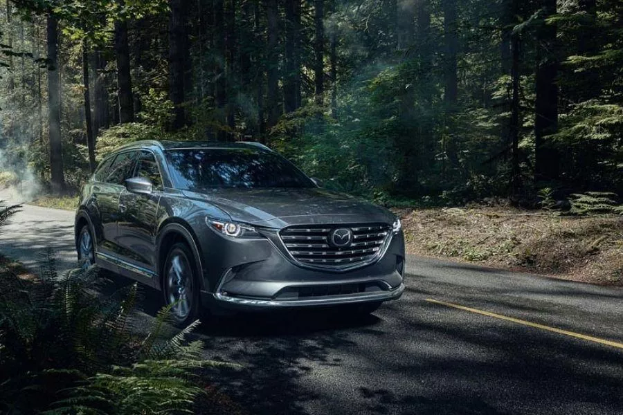A picture of the CX-9 in a forest