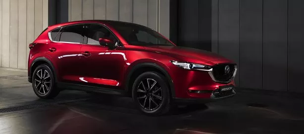 A red Mazda CX-5 angular front view