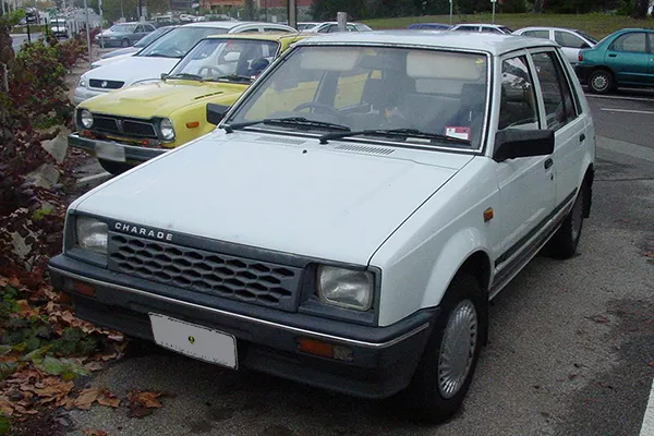 The five-door Daihatsu Charade front view on a parking lot