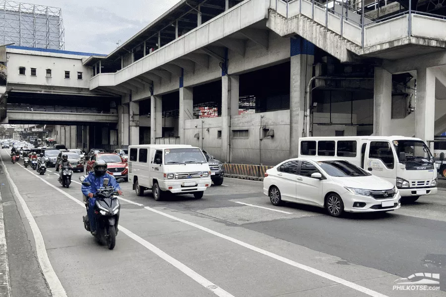 EDSA with cars and motorcycles