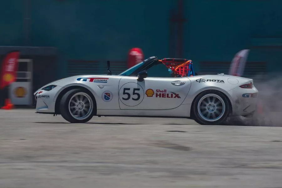 A picture of a Mazda MX-5 on the race track