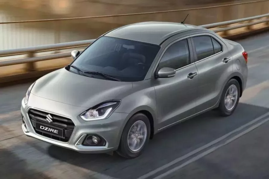 A picture of the Suzuki Dzire on the road.