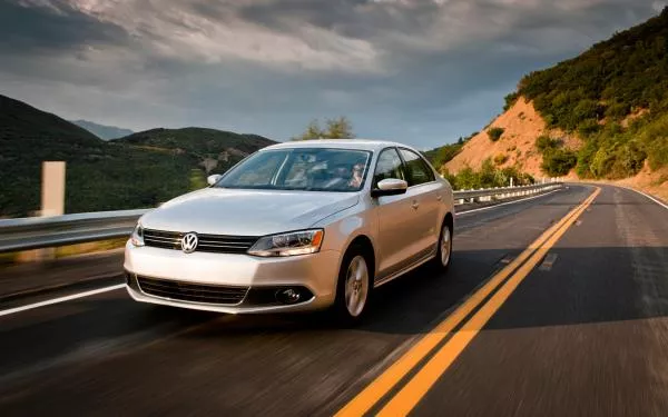 A silver  Volkswagen Jetta TDI on the road