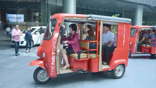 passengers on an e-shuttles in BGC