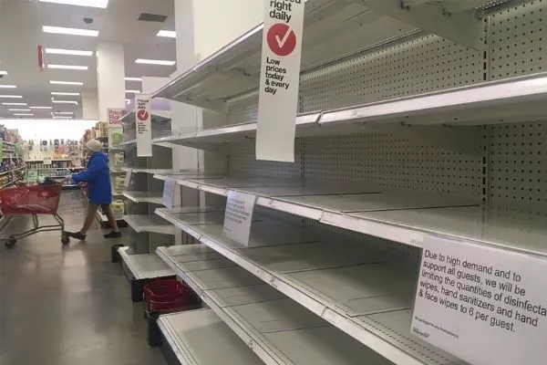 In the U.S., they're running out of bare essentials like hand sanitizer and toilet paper A picture of empty shelved due to panic buying