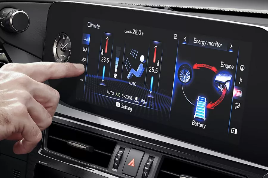 A picture of a man using the Lexus ES 350's 12.3-inch headunit.