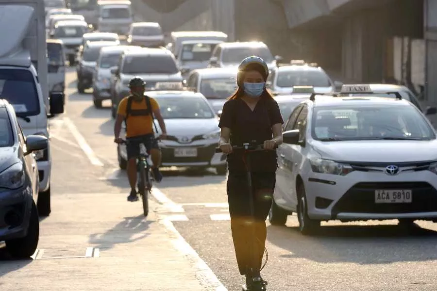 Woman on e-scooter