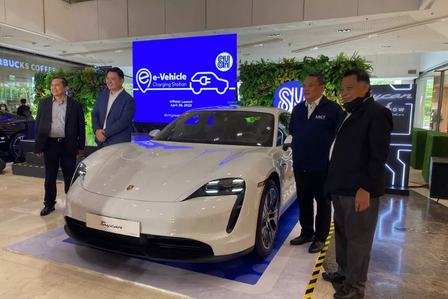 A picture of a Porsche Taycan at the SM EV charging station launch event.