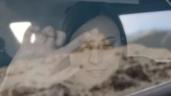 The women inside a car using Feel the view
