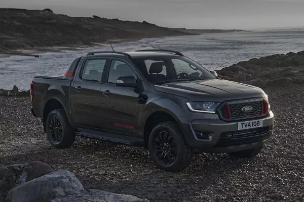 A picture of the Ford Ranger Thunder near the ocean, parked on a cliff