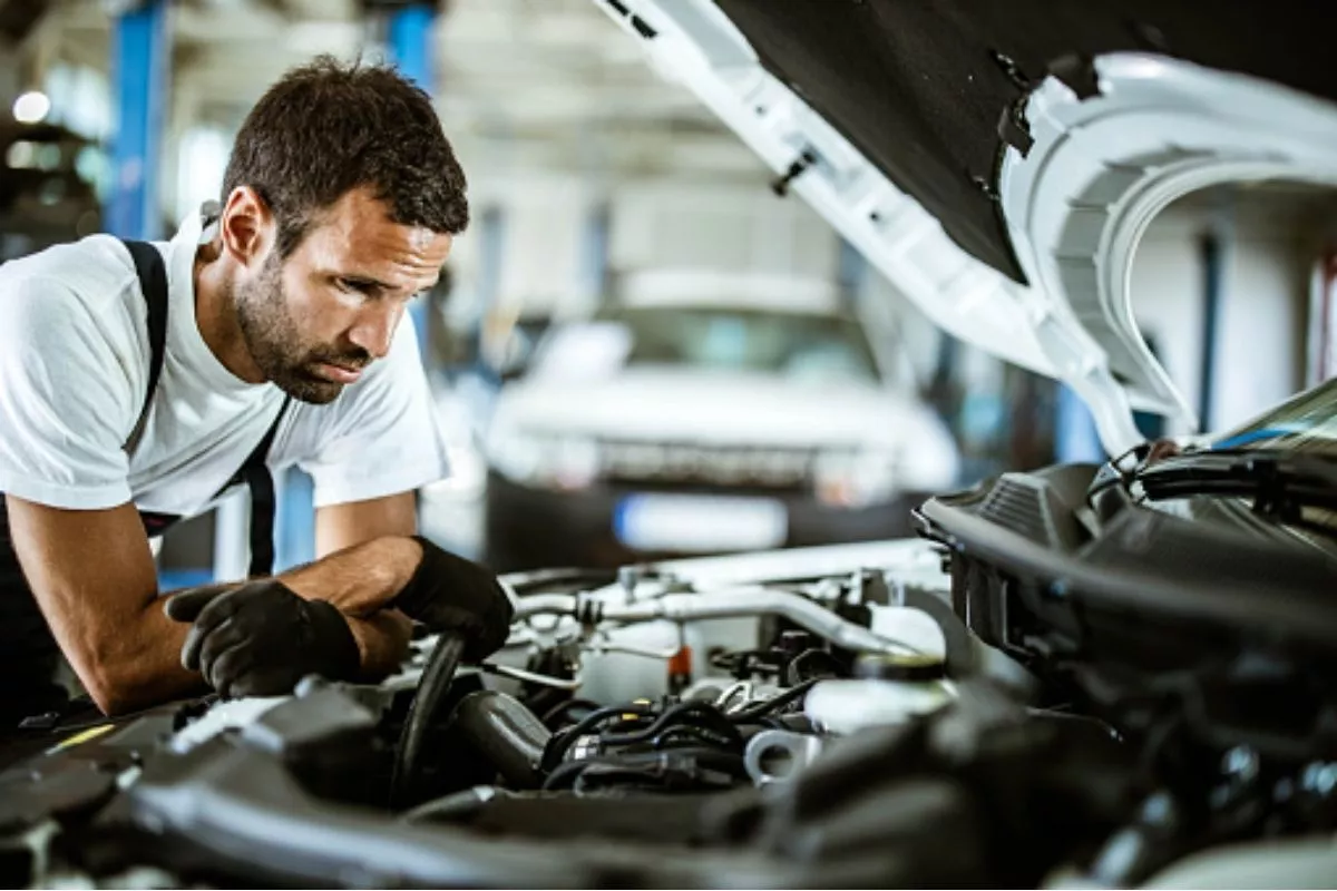 A picture of a frustrated mechanic
