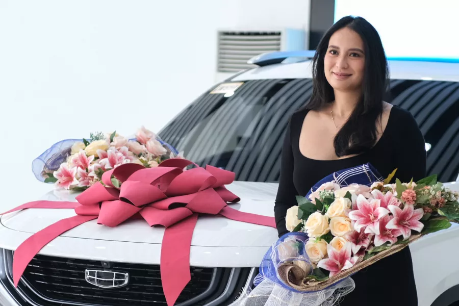 Geely Okavango with Isabelle Daza