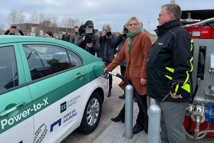 Danish Minister for Transport Trine Bramsen refuels the Geely Emgrand