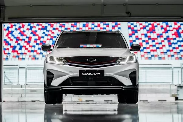 A white Coolray in a garage