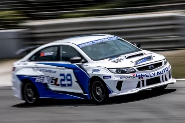 A picture of the Emgrand GT Car on a racetrack.