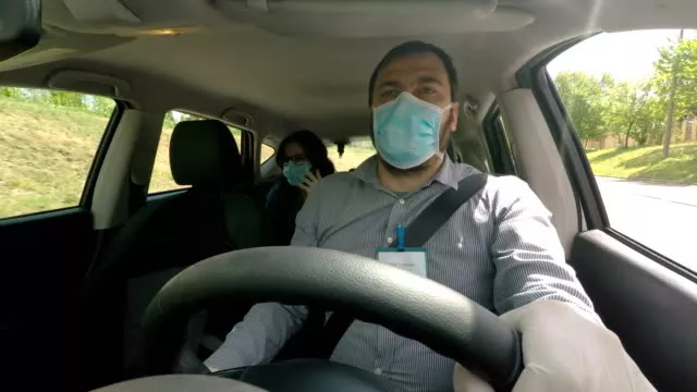 You might be positive for COVID and yet be unaware about it, which is bad for your passengers Driver with passenger