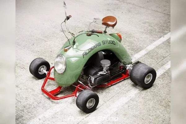 A go-kart finished in olive green