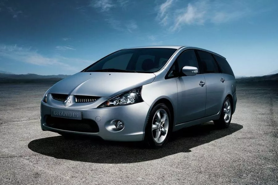 A picture of the Mitsubishi Grandis parked on an open area