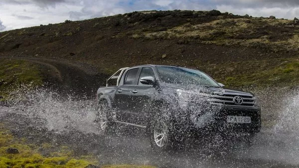 The pickup is made to offer safe handling and ride on both on- and off-road drive Toyota Hilux Arctic Trucks AT35 2018 crossing water