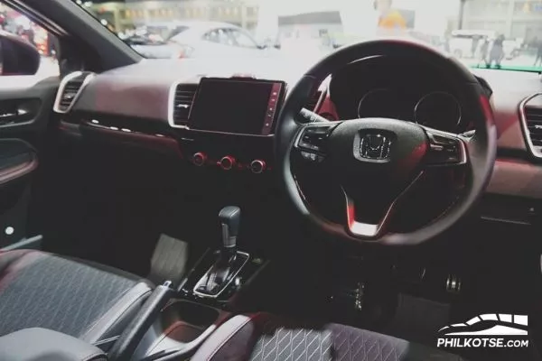 The interior of the City RS is adorned with red stitching A picture of the interior of the City RS Turbo