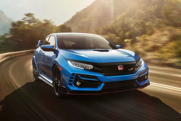 A picture of the Honda Civic Type R on a curvy road
