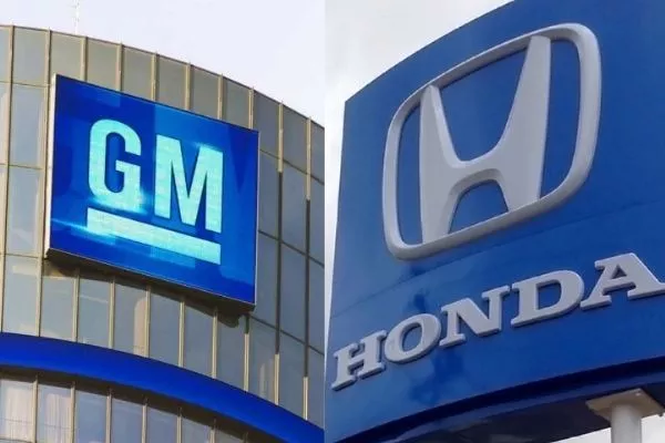 A picture of the GM and Honda logos.