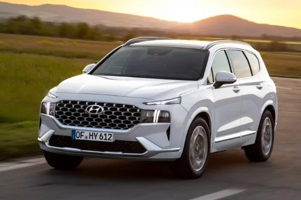 A Hyundai Santa Fe driving down the road